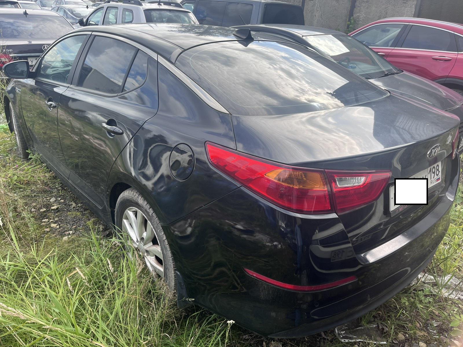 Kia Optima - фото 4