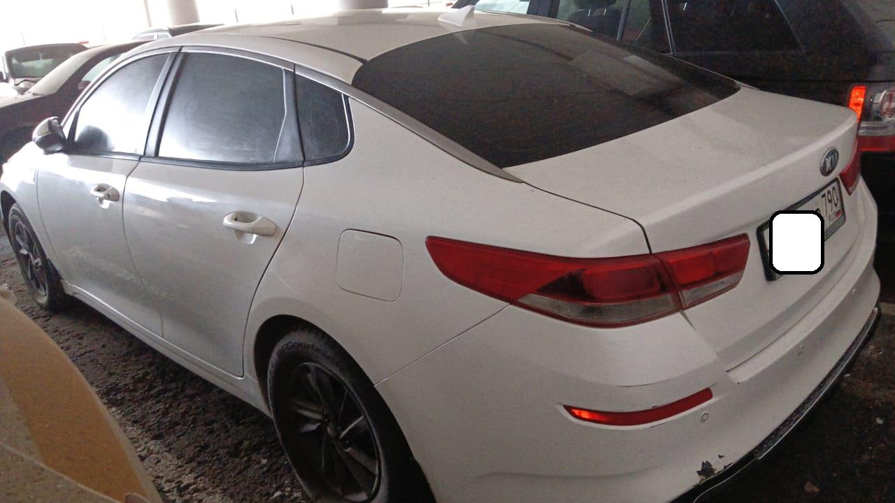 Kia Optima - фото 5