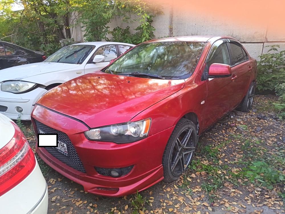 Mitsubishi Lancer - фото 1
