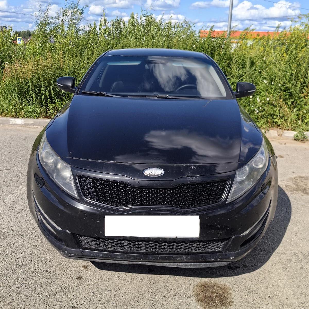 Kia Optima - фото 1