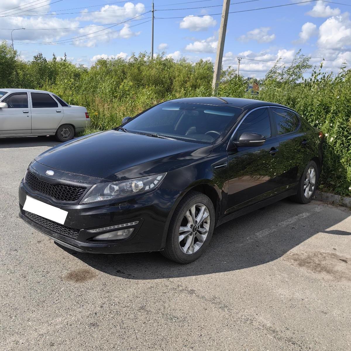 Kia Optima - фото 2