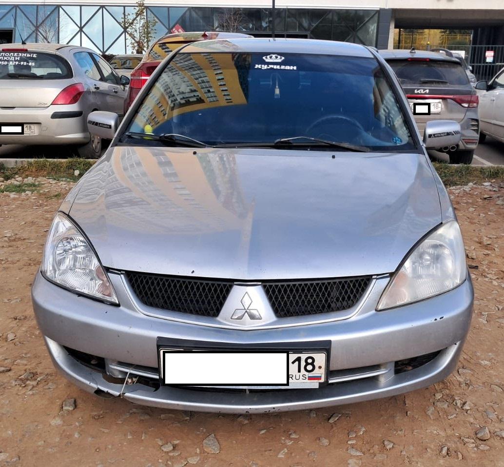 Mitsubishi Lancer - фото 1