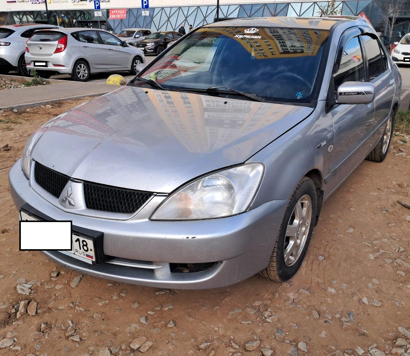 Mitsubishi Lancer - фото 2