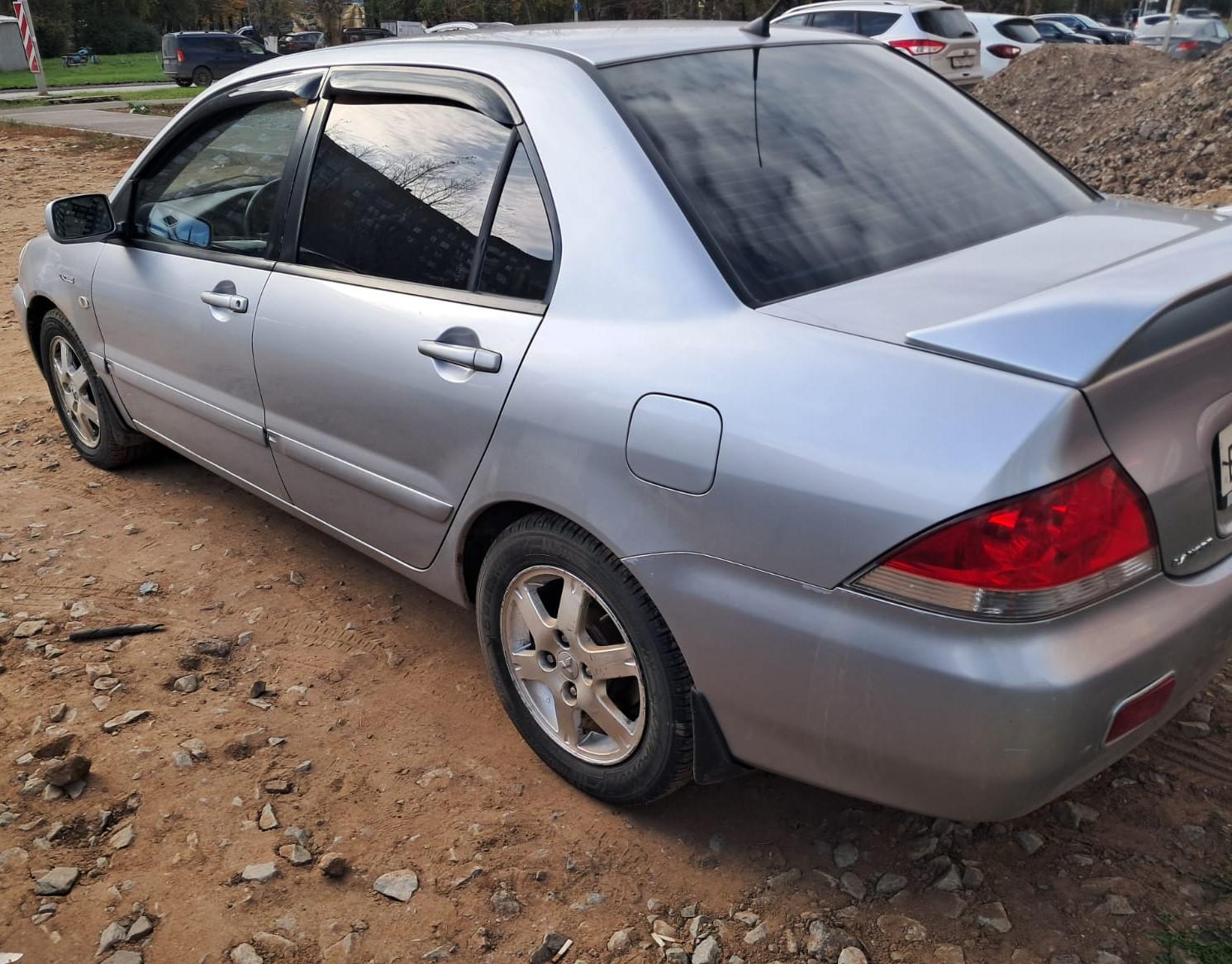 Mitsubishi Lancer - фото 4