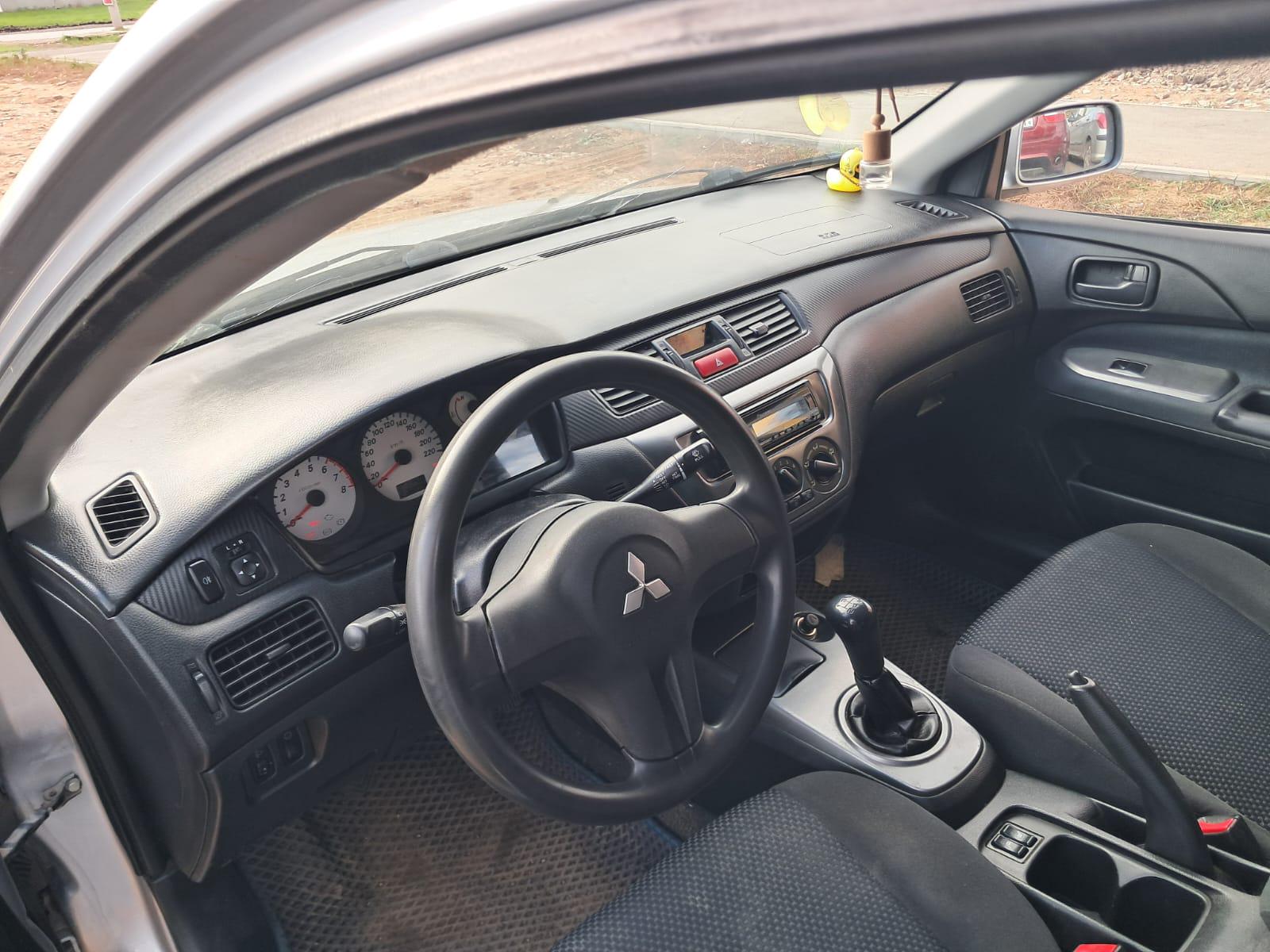 Mitsubishi Lancer - фото 7