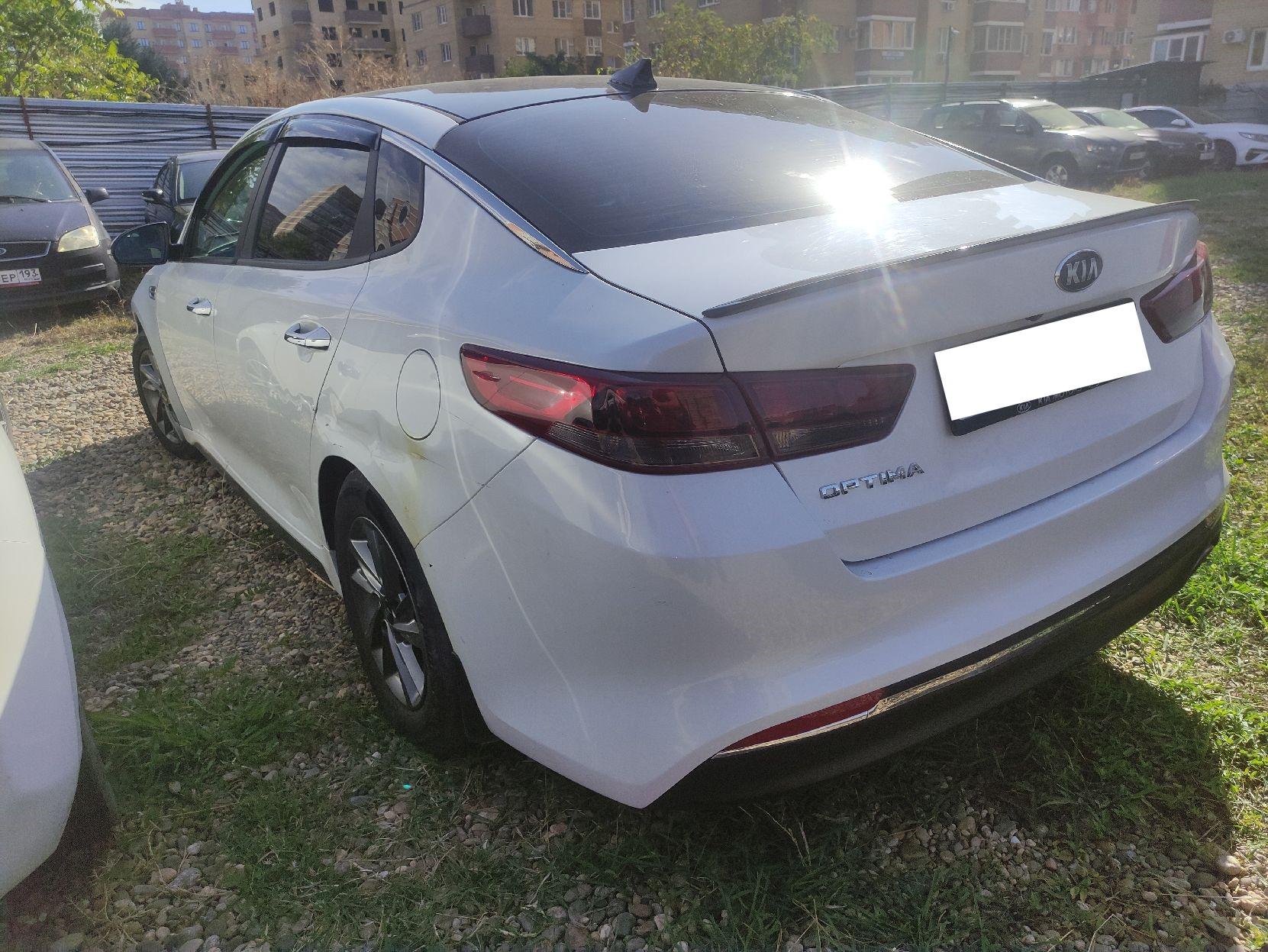 Kia Optima - фото 5