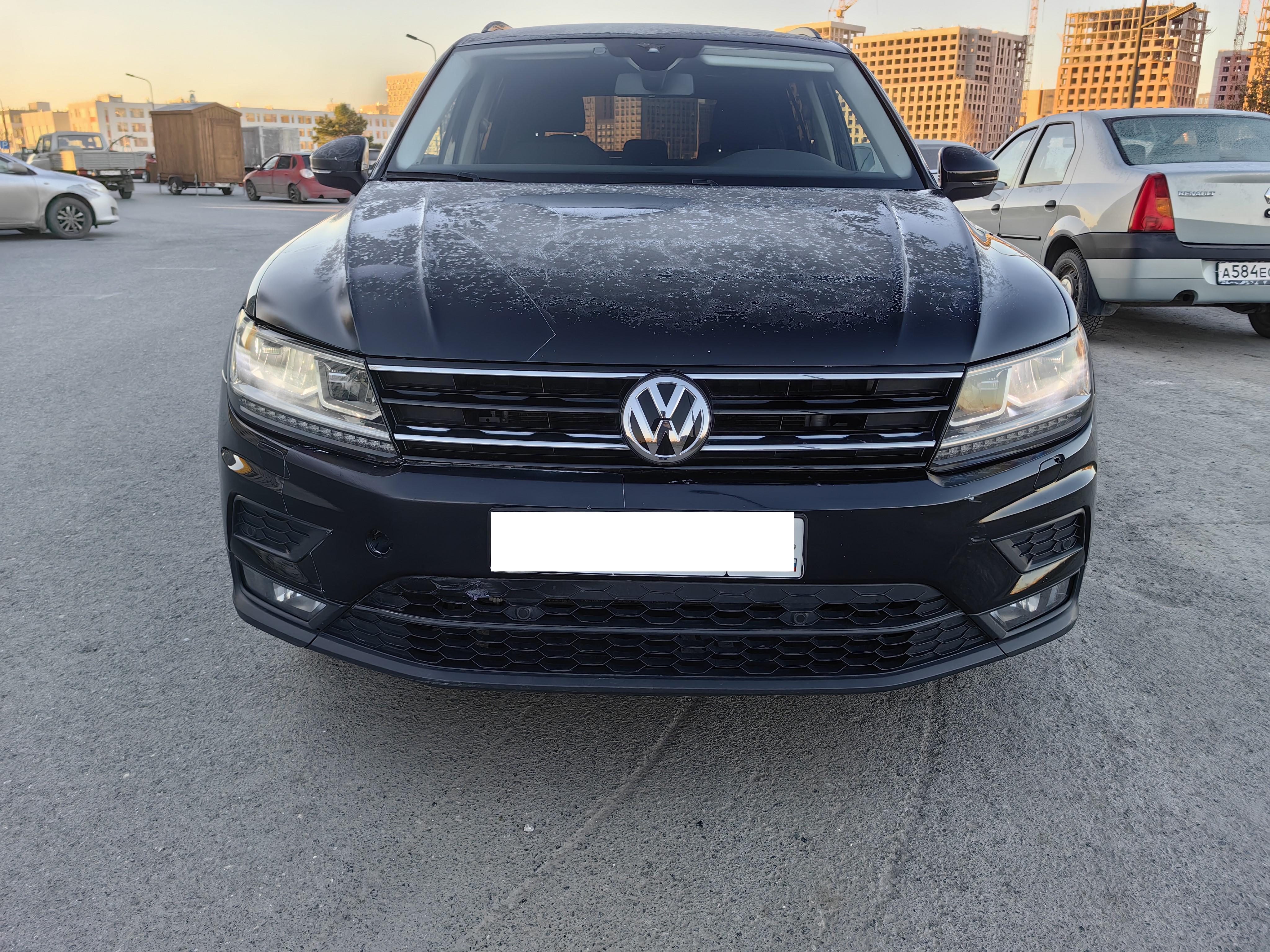 Volkswagen Tiguan - фото 1