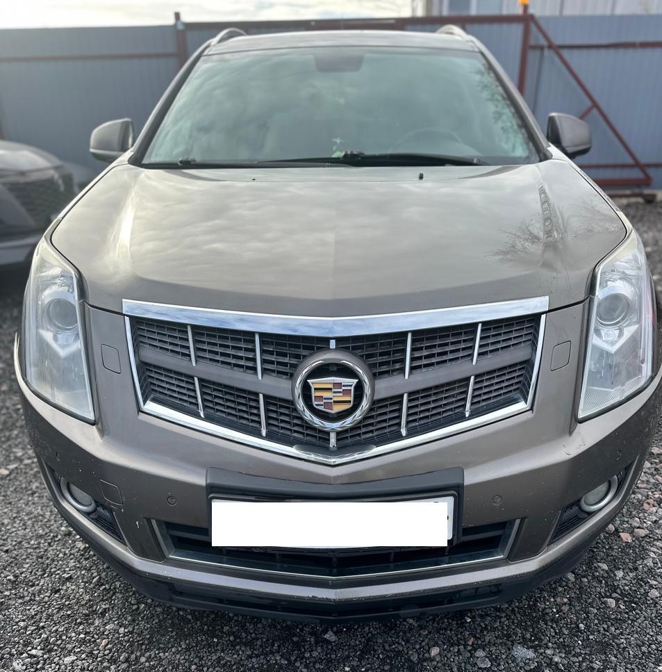 Cadillac Srx - фото 1