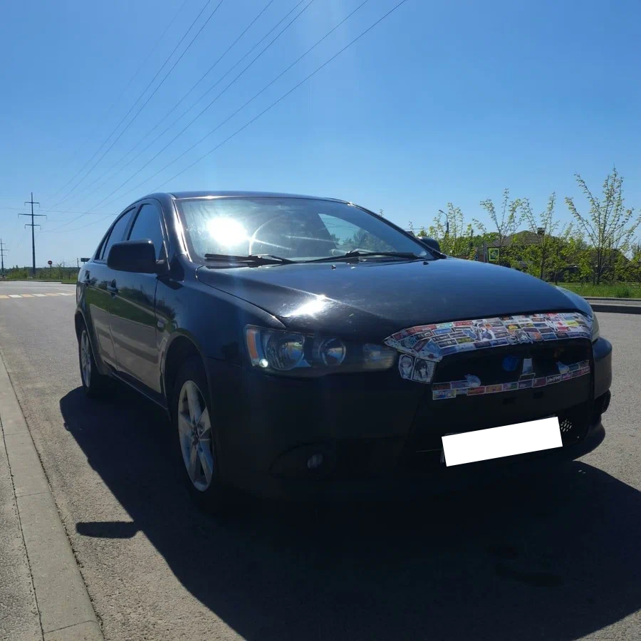 Mitsubishi Lancer - фото 2